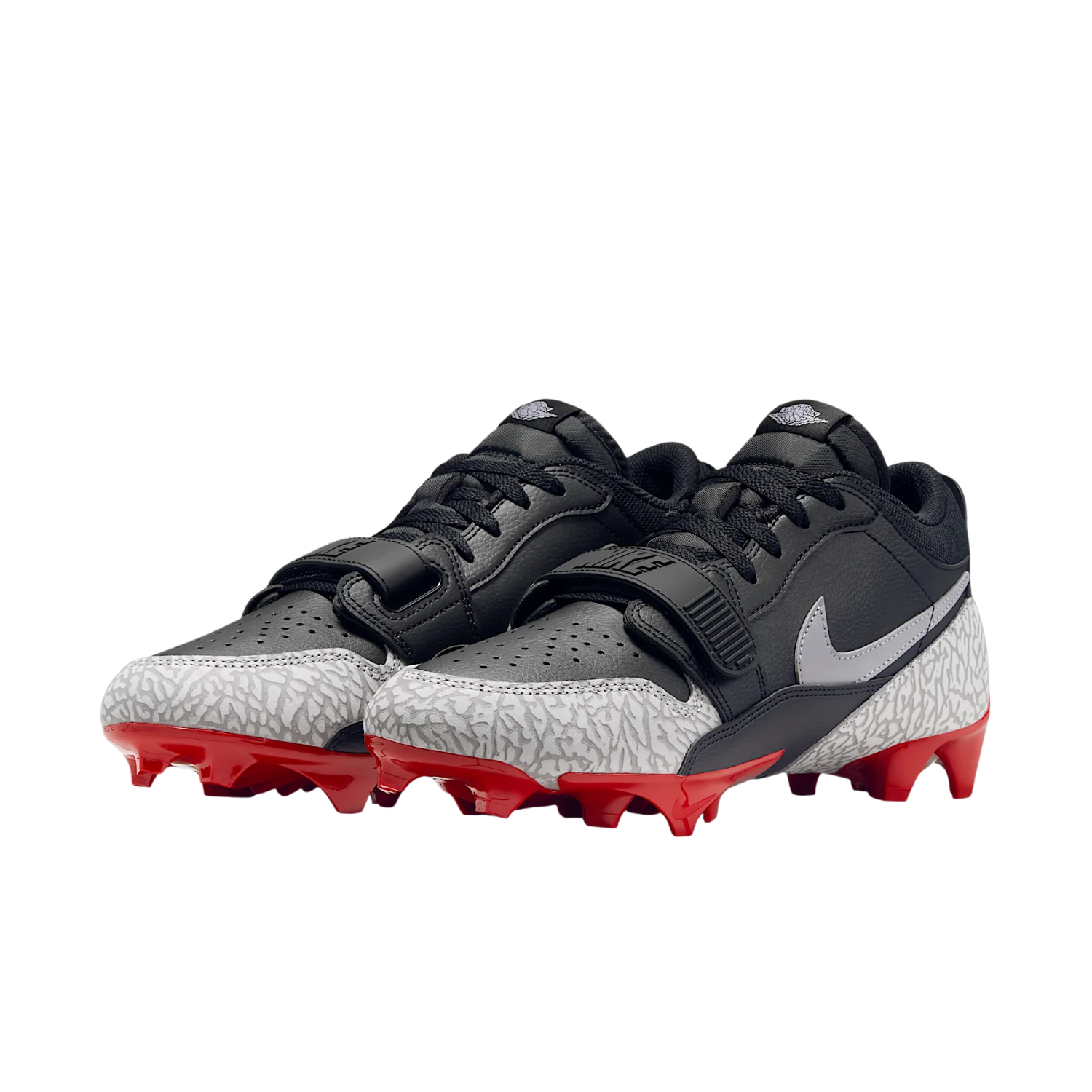 Jordan Legacy 312 Low TD cleat in black and cement grey with red outsole, lateral view