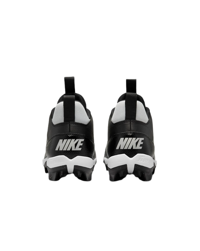 Rear view of black and white Nike Alpha Menace 4 Shark football cleats with Nike logo on heel and studded soles for traction